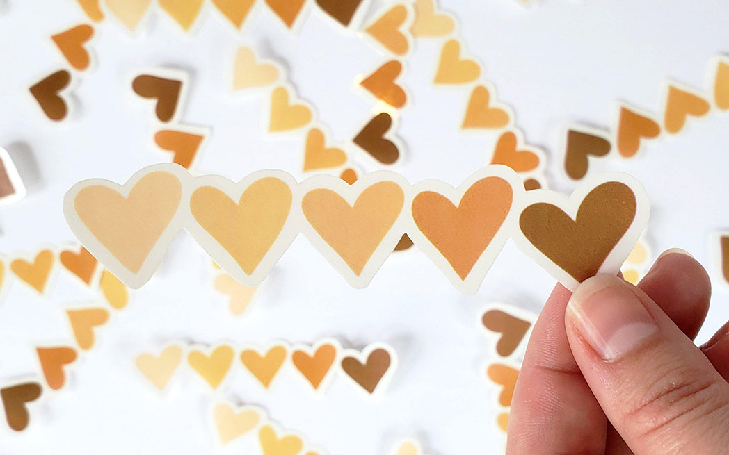 Photo of the Diverse Hearts Clear Vinyl Sticker by Lucky Dog Design Co.