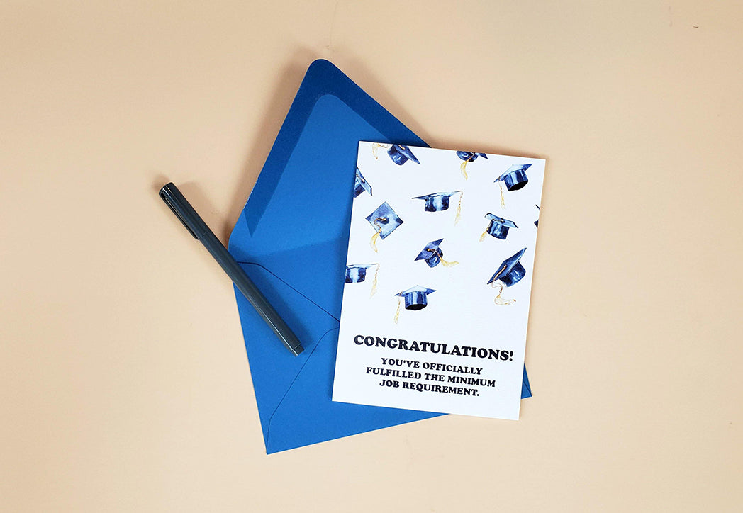 Photo of the Minimum Job Requirement Funny Graduation Card by Lucky Dog Design Co.