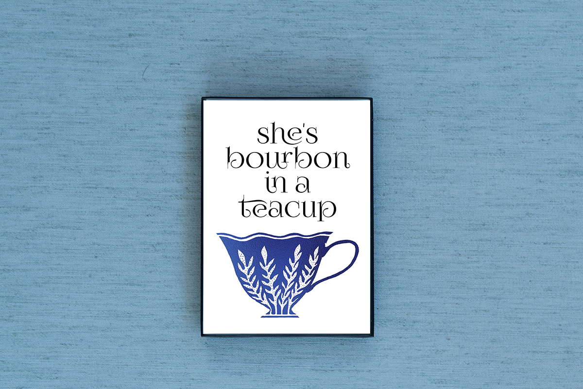 Photo of the She's Bourbon in a Teacup Foiled & Framed Print in Gold by Lucky Dog Design Co.